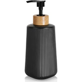 Nortsa Miira glass soap dispenser with matte black finish for modern bathrooms.