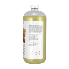 NOW Foods Sweet Almond Oil label close-up highlighting purity and unscented formula