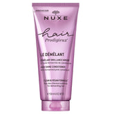 Nuxe Hair Prodigieux High Shine Conditioner bottle for easy detangling and radiant shine.