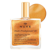 Nuxe Huile Prodigieuse Shimmer bottle with pearly particles for radiant skin and hair