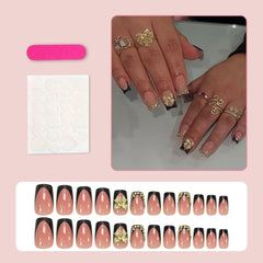 Nxtpz Bow: detalle de acabado brillante en uñas negras con cristales