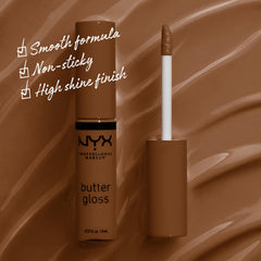 NYX Butter Gloss Brown Sugar wear swatch shows sheer to medium coverage on lips.