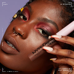 Close-up of creamy texture delivering a crack-free matte look.