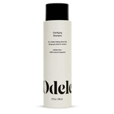 Odele Clarifying Shampoo en bote mostrando limpieza profunda para todo tipo de cabello.