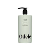 Odele Smoothing Shampoo bottle showing moisture and frizz control