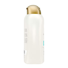 OGX Quenching Coconut Curls conditioner with honey visible for humectant hydration.