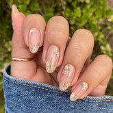 OHWODA pink spring press-on nails with almond shape and daisy design for elegant nails