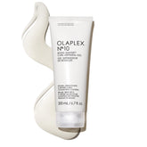 Olaplex No.10 Bond Shaper bottle pour demonstrates easy application and hydration for defined curls.