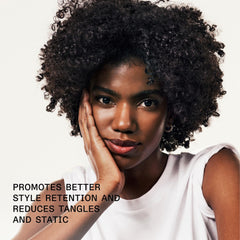 Olaplex No. 9 satin shine across strands for gloss.