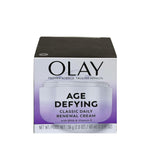 Olay Age Defying Renewal bottle close-up, signaling hydration and skin renewal.