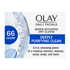 Olay desmaquillantes toallitas junto a botella, limpieza rápida para rostro y cuello