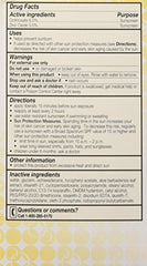 OLAY protección de amplio espectro SPF 15 para piel sensible.