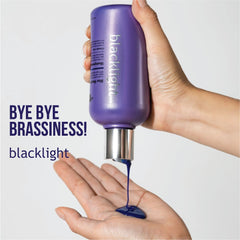 Oligo Professionnel Blacklight Blue conditioner bottle demonstrates hydrating care