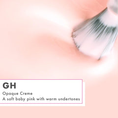 Olive & June wide fan brush applying polish for precise results.