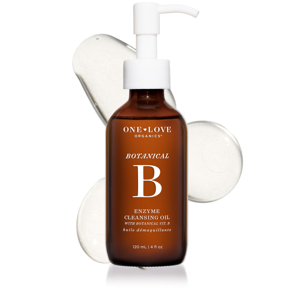 One Love Organics Botanical B Enzyme Cleansing Oil bottle closeup for gentle makeup removal.
