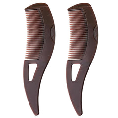 Optisake dandruff comb with hollow teeth close-up for deep exfoliation and buildup removal.