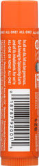 Close-up of orange-ginger scent on Dr. Bronner's lip balm for refreshing aroma.