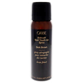 Oribe Airbrush Root Touch Up Spray bottle applying seamless color to roots for quick grey coverage