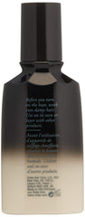 Hair appears shiny and sleek after applying Oribe Balm D'Or Heat Shield.