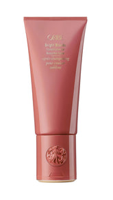 Oribe Bright Blonde Conditioner bottle showing a premium violet formula for color-brightening care