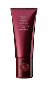 Oribe Beautiful Color conditioner bottle shows color-safe formula for vibrant hair.