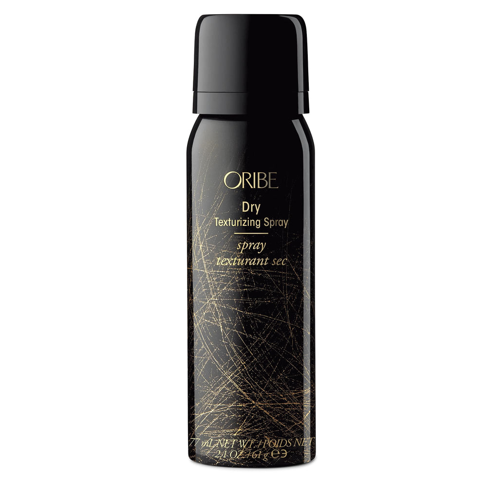 Oribe Dry Texturizing Spray bottle delivering invisible volume boost.
