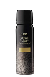 Oribe Gold Lust Dry Shampoo bottle showcasing translucent powder for oil absorption between washes.