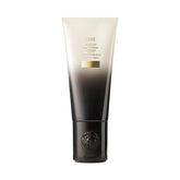 Oribe Gold Lust Repair & Restore Conditioner bottle promotes revived, glossy hair.