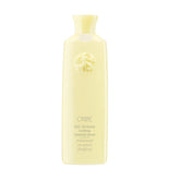 Oribe Hair Alchemy Fortifying Treatment bottle close-up showing conditioning serum for fragile hair
