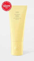 Oribe Hair Alchemy Resilience Conditioner close-up texture shows creamy, luxurious formula