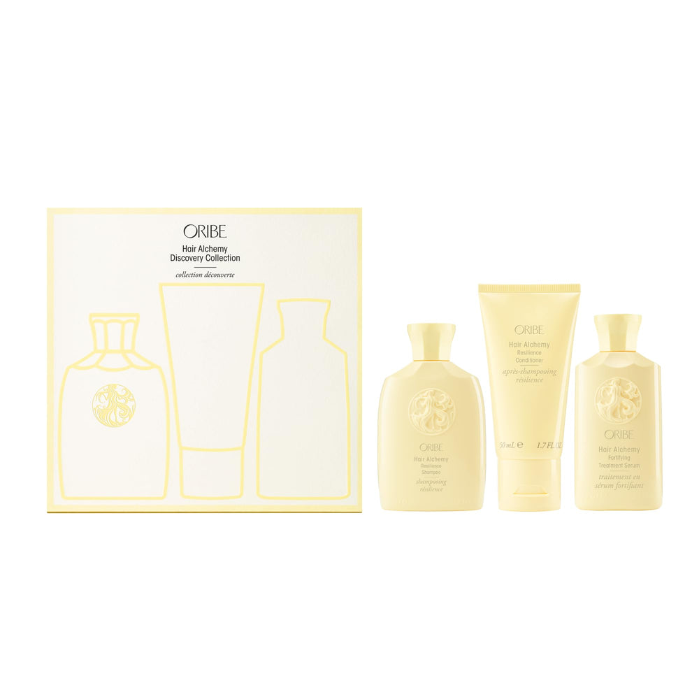 Oribe Hair Alchemy Shampoo travel bottle front for smooth, resilient strands on the go.