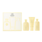 Oribe Hair Alchemy Shampoo travel bottle front for smooth, resilient strands on the go.