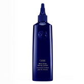 ORIBE Mirror Rinse bottle highlighting glass hair treatment for radiant shine