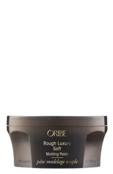 Oribe Rough Luxury Soft Molding Paste jar showing flexible hold for defined texture.