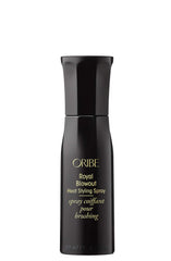 Oribe Royal Blowout spray bottle with heat protection for smoother styling.