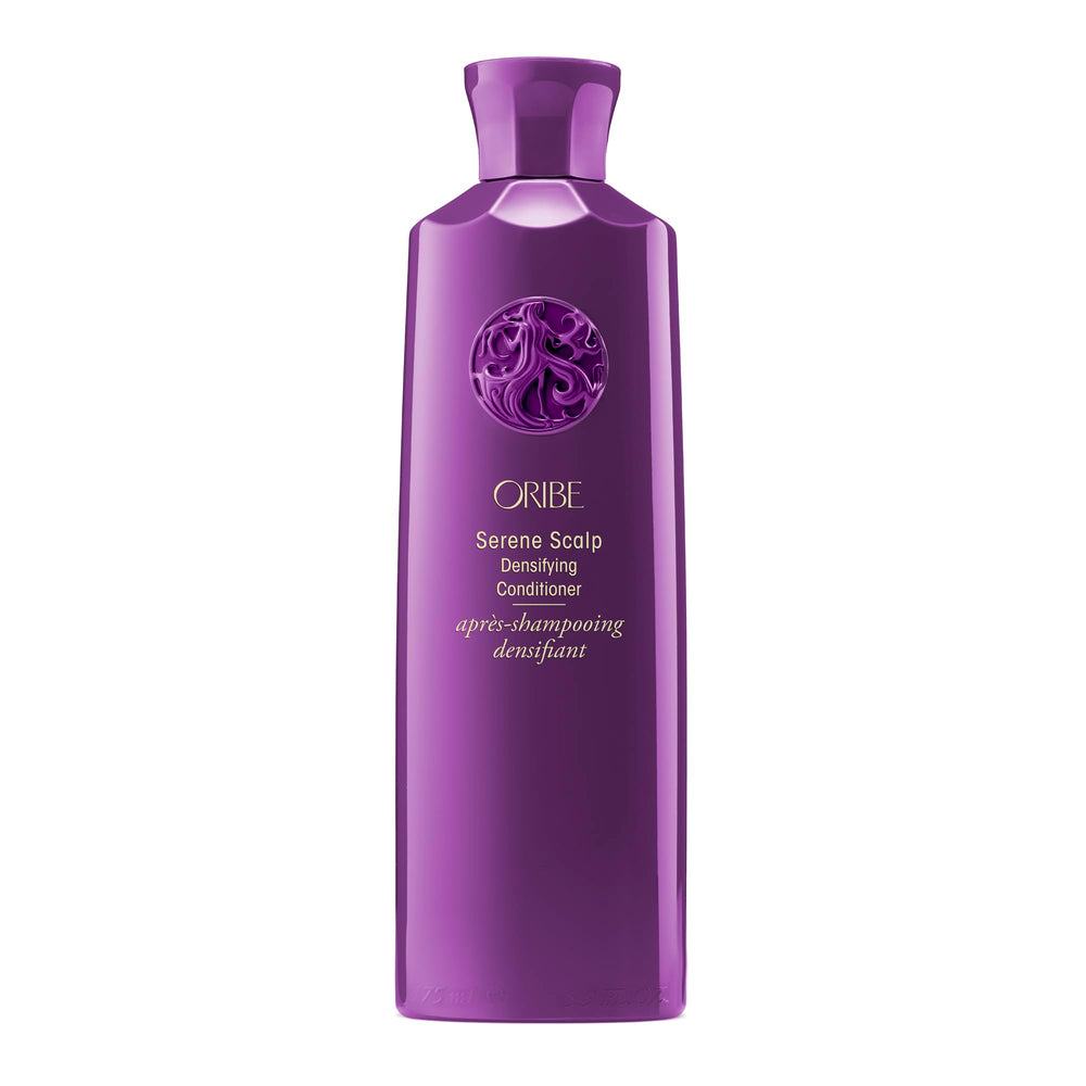 Oribe Serene Scalp Densifying Conditioner bottle on display, suggesting volume and fullness.