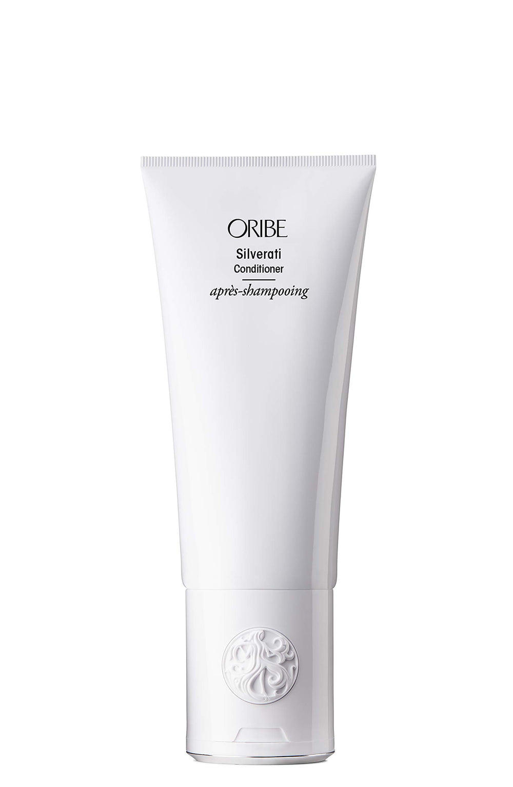 Oribe Silverati conditioner bottle close-up highlighting brightening for silver hair.
