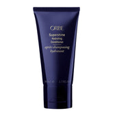 Oribe Supershine Hydrating Conditioner travel-size bottle for lightweight on-the-go hydration.