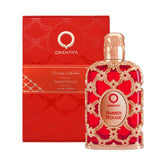 Orientica Amber Rouge bottle close-up, a luxurious unisex scent for evening wear.