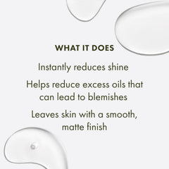 Cotton pad applying Origins Clear Improvement toner to face.