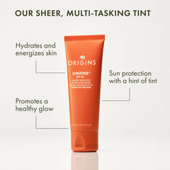 Origins GinZing pump closeup highlighting smooth application and light hydration.