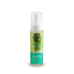 ORS Olive Oil Max Moisture Mousse on curls showing defined coils.