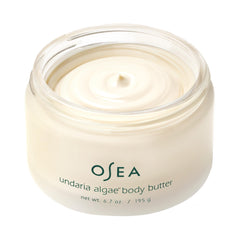 Close-up of whipped texture revealing rich moisture for OSEA Undaria Algae Body Butter.