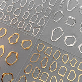 OSTTMA pegatinas 5D para uñas con bordes geométricos en acabado oro-plata