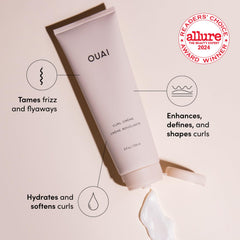 Dry curls refreshed with OUAI Curl Cream to revive shine.