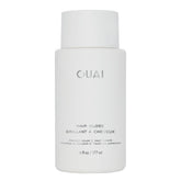 OUAI Hair Gloss bottle in shower showing shine enhancement for glossy hair