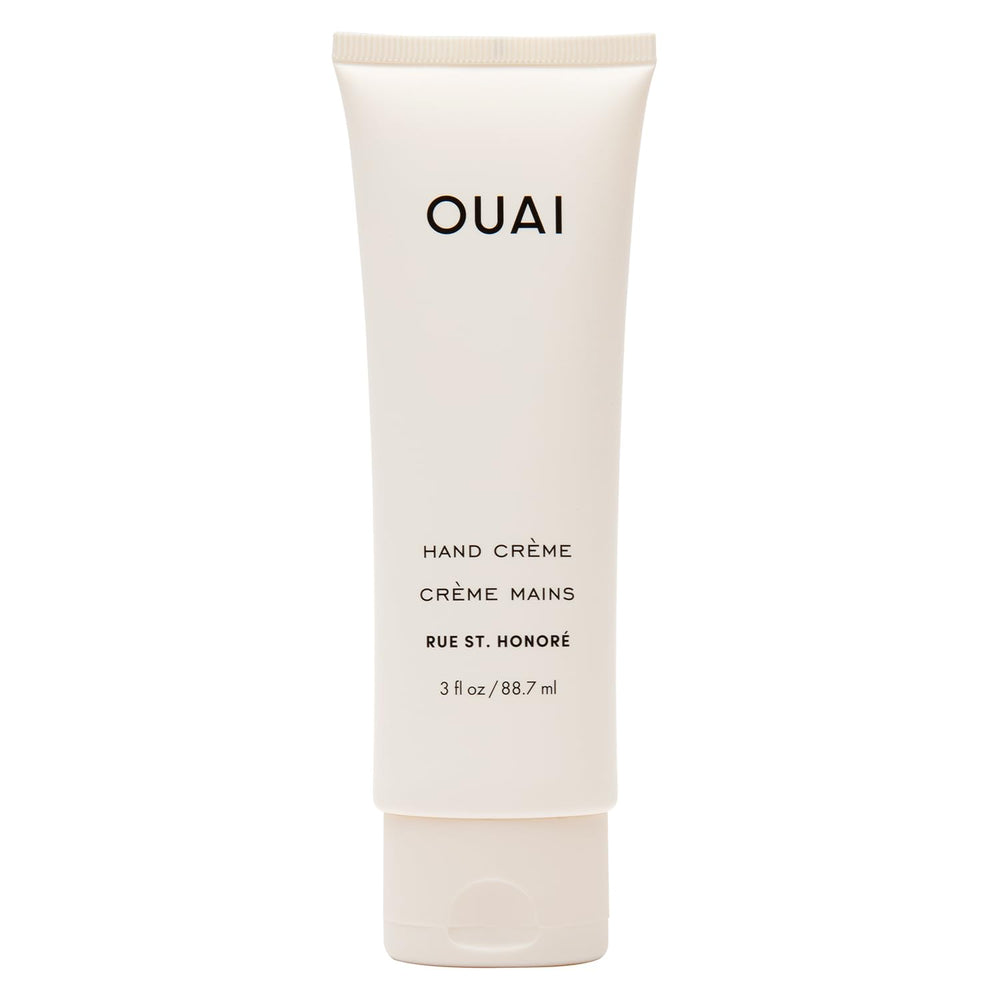 OUAI Hand Cream jar close-up showing creamy texture for soft, nourished hands.
