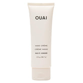 OUAI Hand Cream jar close-up showing creamy texture for soft, nourished hands.