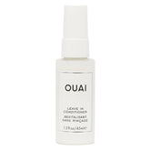 OUAI leave-in conditioner bottle ready for heat protection and detangling on the go.