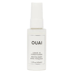 OUAI leave-in conditioner bottle ready for heat protection and detangling on the go.